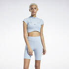 Reebok Freestyle Graphics Short Sleeve Crop Top (Dam)