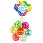 7 färgglada studsbollar i nät