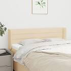 vidaXL Sänggavel med kanter gräddvit 147x16x78/88 cm tyg 3118911