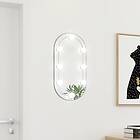 vidaXL Spegel med LED-lampor 60x30 cm glas oval 3102974