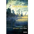 Ringar på svart vatten