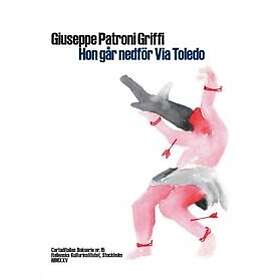 Hon går nedför Via Toledo