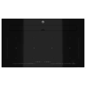 Induction hob with integrated extractor
