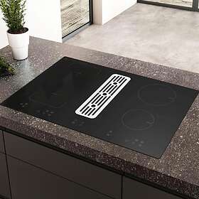 Induction hob with integrated extractor