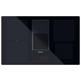 Induction hob with integrated extractor